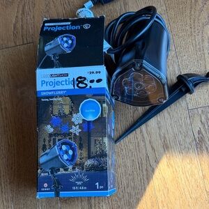 LED Lightshow Snowflurry - Black (Blue and White snowflakes on wall, garage etc)